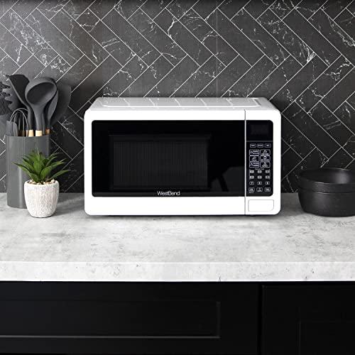 West Bend West Bend WBMW71W Microwave Oven 700-Watts Compact with 6 Pre Cooking Settings, Speed Defrost, Electronic Control Panel and Glass Turntable, White