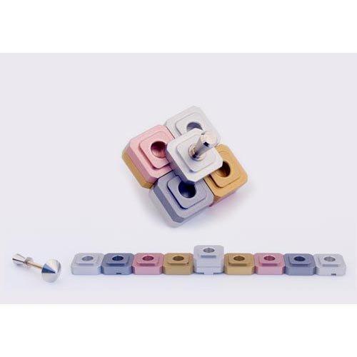 Baltinester Agayof Travel Hanukkah Menorah: Dreidel Shaped 7.5 X 30 cm / 2.95\" X 11.81\" - Silver Grey Gold Pink mn014
