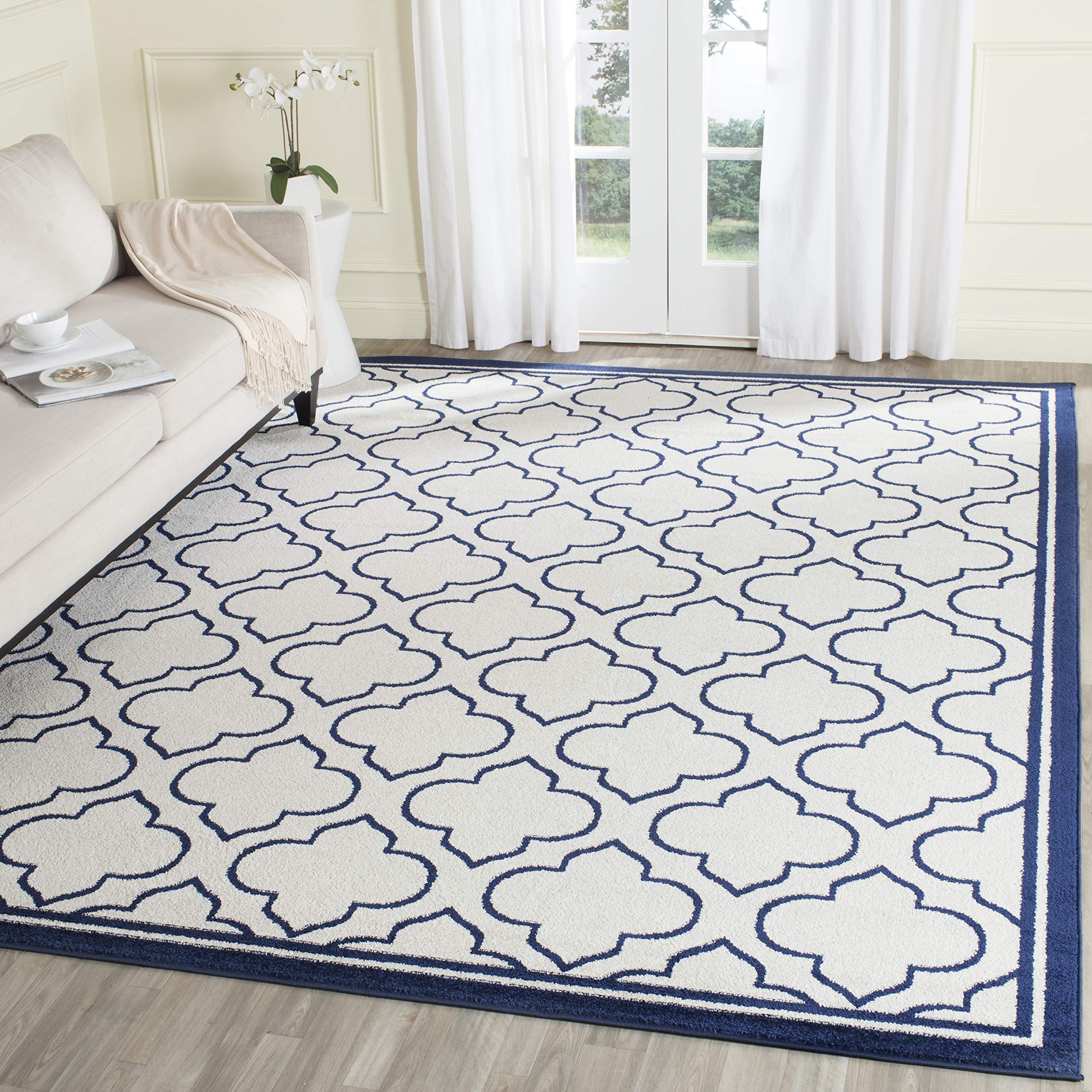 Safavieh SAFAVIEH Amherst Collection Area Rug - 6' x 9', Ivory & Navy, Moroccan Geometric Design, Non-Shedding & Easy Care, Ideal for High Traffic Areas in Living Room, Bedroom (AMT412M)