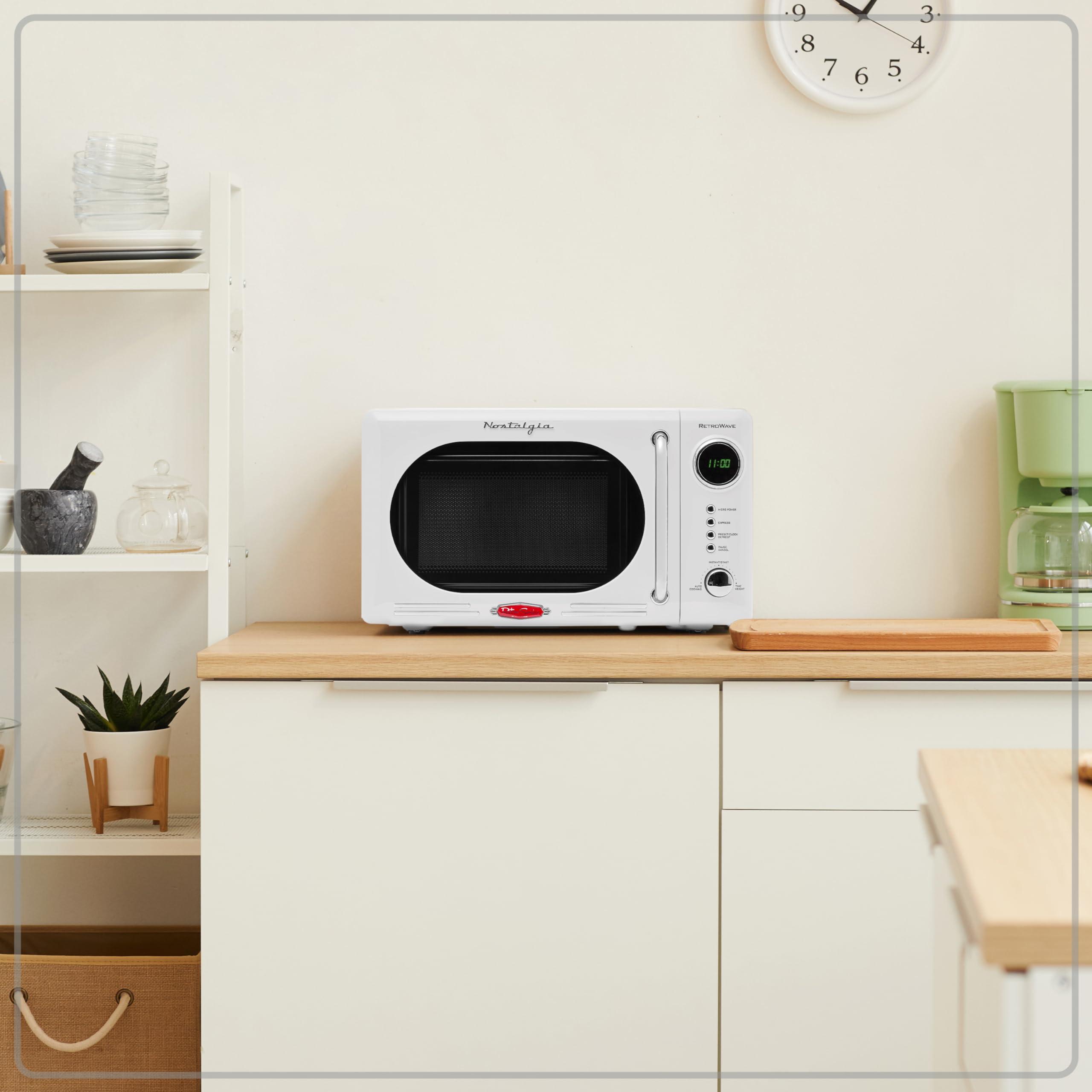 Nostalgia Nostalgia Retro Compact Countertop Microwave Oven - 0.7 Cu. Ft. - 700-Watts with LED Digital Display - Child Lock - Easy Clean Interior - White
