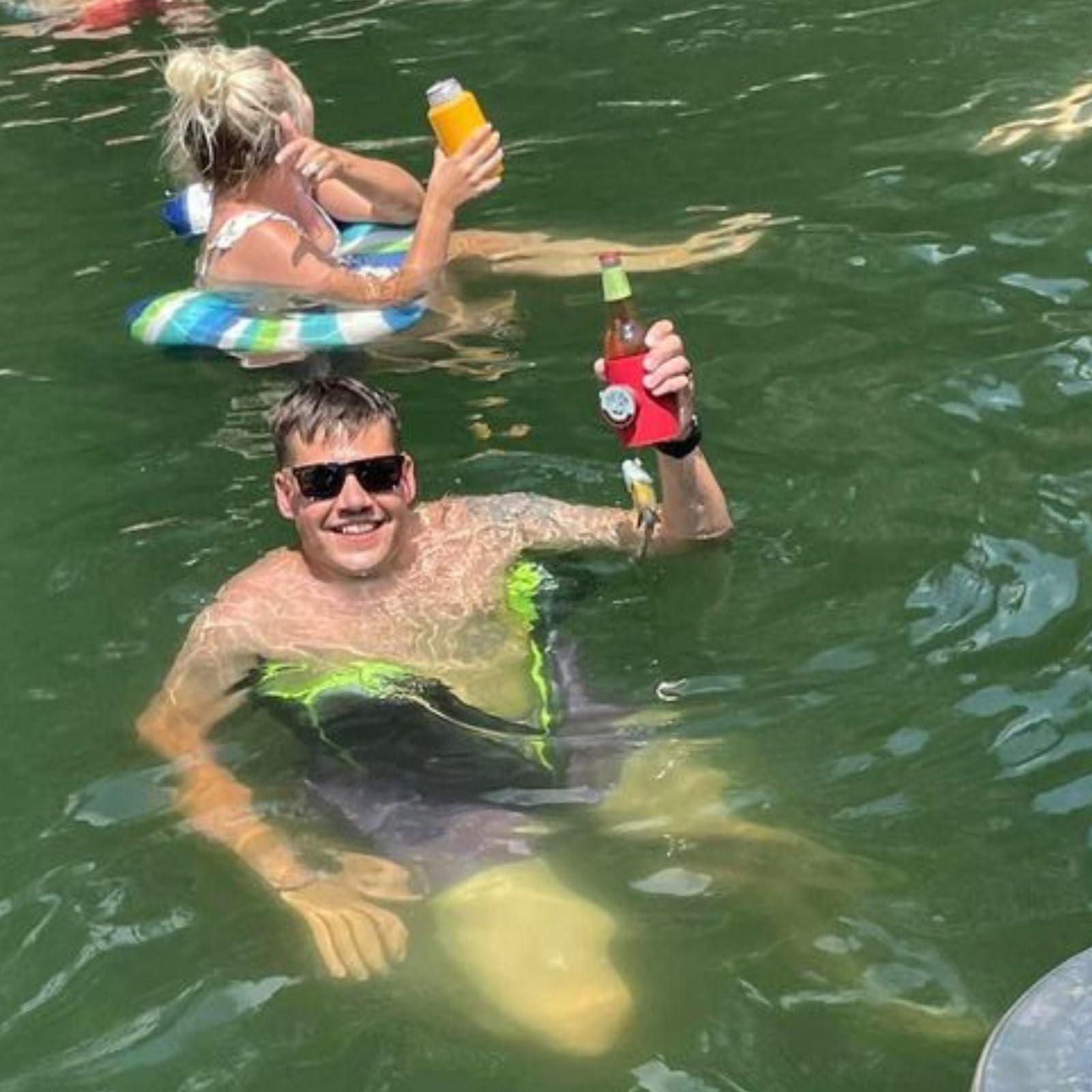 Chill-N-Reel Chill-N-Reel Fishing Can Cooler (from Shark Tank) | Hard Shell Drink Holder with Hand Line Reel Attached | Fits Standard Insulator Sleeves or Coozies | Unique Fun Fishing Gift (Crimson & Spill Guard)