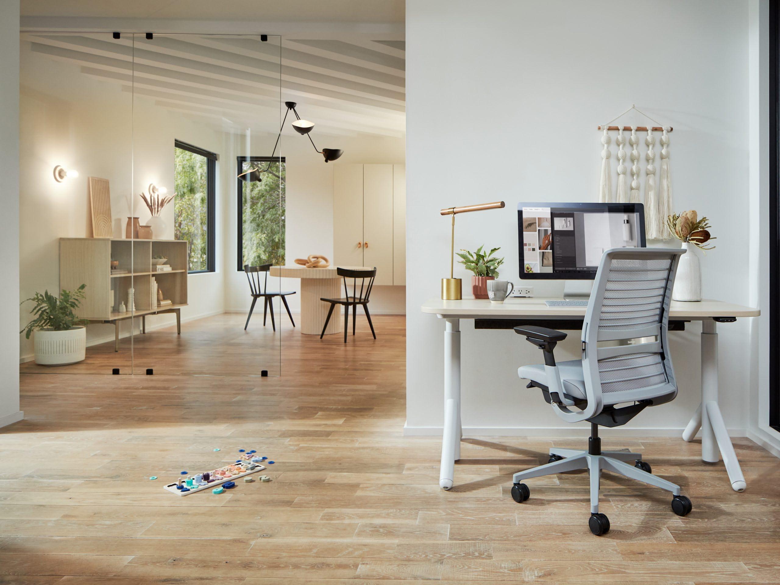 Steelcase Steelcase Think Office Chair - Ergonomic Work Chair - Lumbar Support - 4D Arms - Dark Merle Frame with 3D Knit Back - Peacock Fabric with Wheels for Hard Flooring