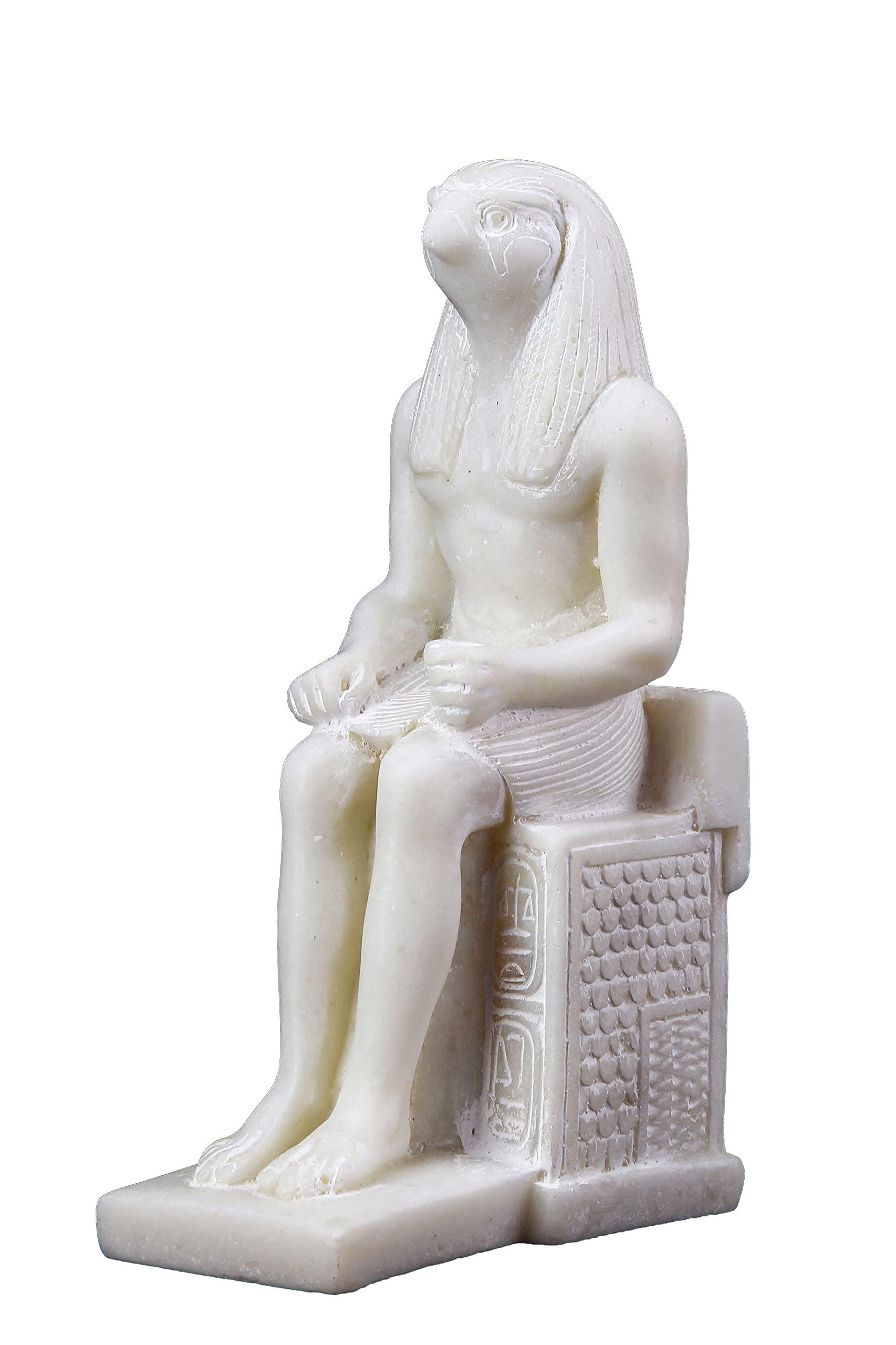 HomeLoft Basics Unique ancient Egyptian Falcon Bird god Horus seated statue marble stone made in Egypt. His name means he who is above and he who is distant. He was a god of the sky and war.
