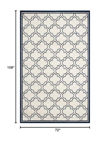 Safavieh SAFAVIEH Amherst Collection Area Rug - 6' x 9', Ivory & Navy, Moroccan Geometric Design, Non-Shedding & Easy Care, Ideal for High Traffic Areas in Living Room, Bedroom (AMT412M)