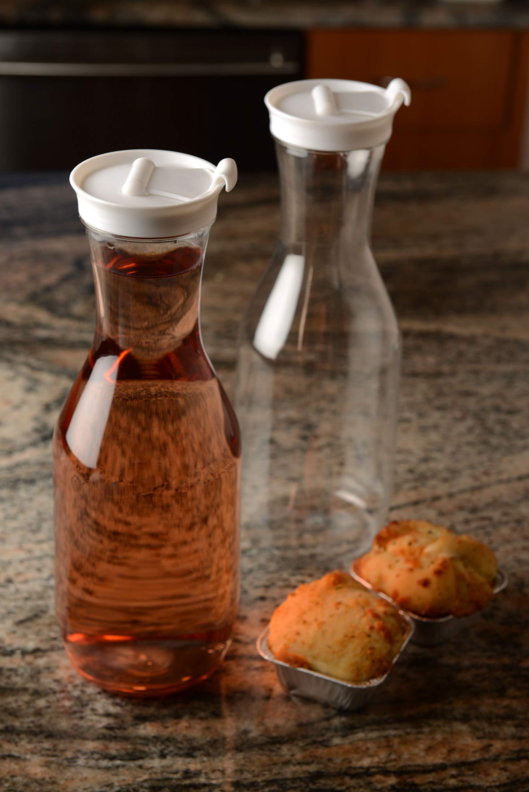 EcoQuality [24 PACK] Clear Plastic Heavy Duty Pitcher - Large Water Carafes, Plastic Bottles with Flip Top Lid, Beverage Pitchers with Lid - BPA Free Plastic Decanter, Juice, Ice Tea, Picnic, Catering (50 Oz)